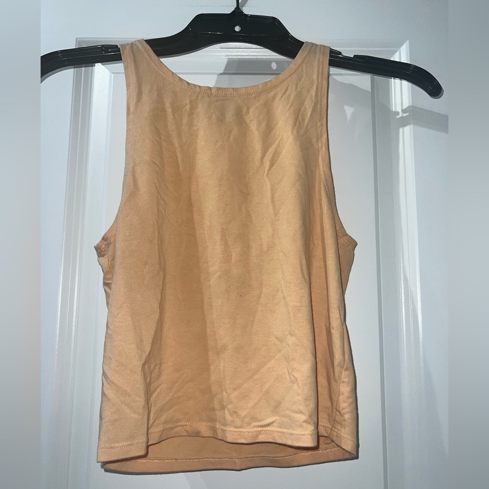 Light orange tank crop